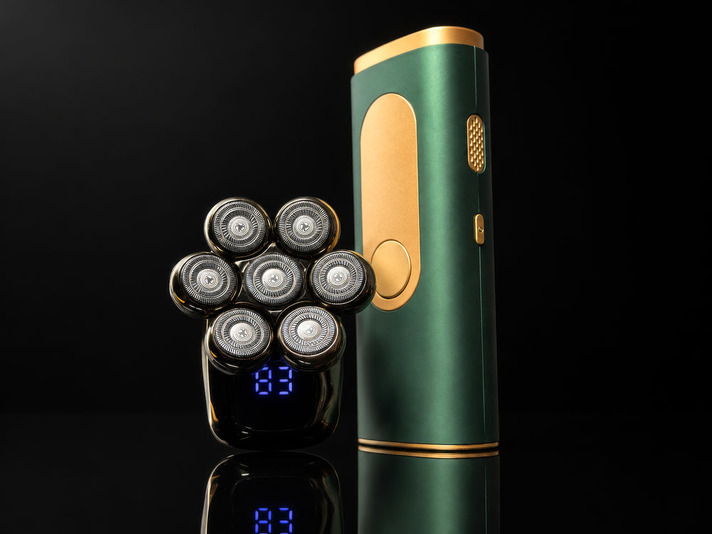 A green and gold electric shaver shown with six detachable shaving heads on a black reflective background.